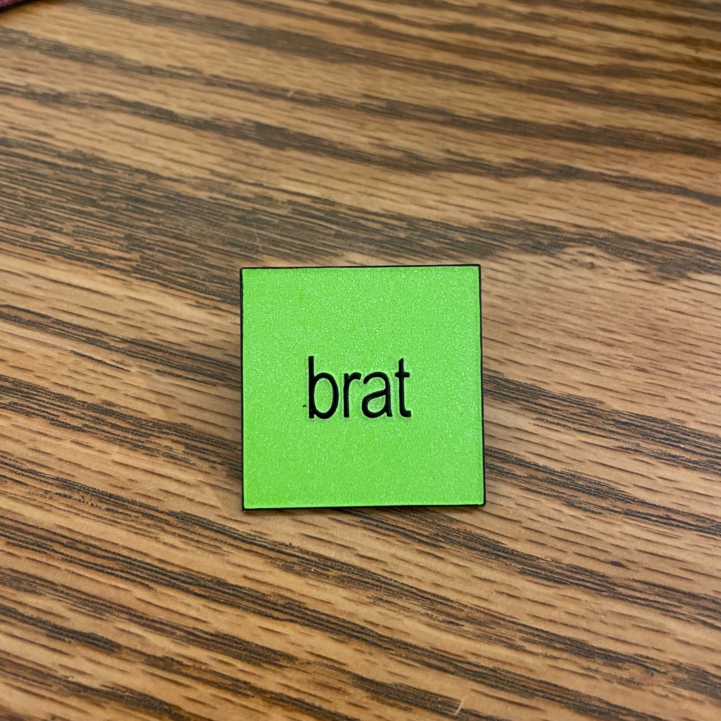 BRAT enamel pin by @pinlord